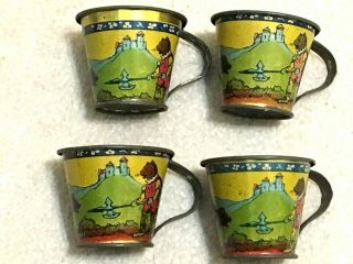 VINTAGE CHILD ' S TOY TIN LITHO METAL Pitcher,  4 cups,  4 Saucers,  Nursery Rhymes 5