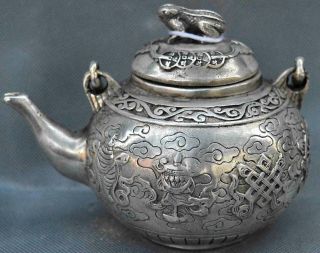 Collectable Ancient Art Old Miao Silver Carve Buddhism Totem Pray Toad Tea Pot
