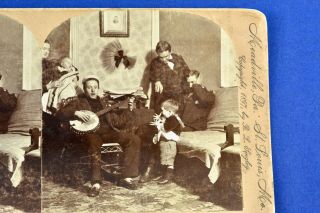 Stereo View Card by Keystone View Co. ,  1897: Sailor Playing 5 - String Banjo 2