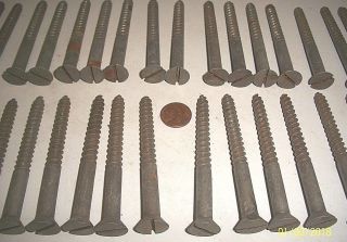 39 - Large Old Slotted,  Flat - Head Wood Screws,  Long Thick Ones 3 1/2 " X 5/16 "