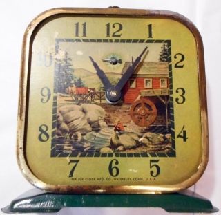 Vtg.  The Lux Clock Manufacturing Co Grist Mill Green Enamel Table Clock