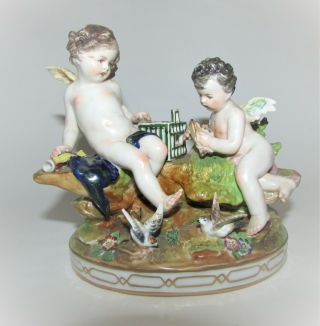 Antique Dresden Volkstedt Porcelain Figural Group of a Putto with Birds 2