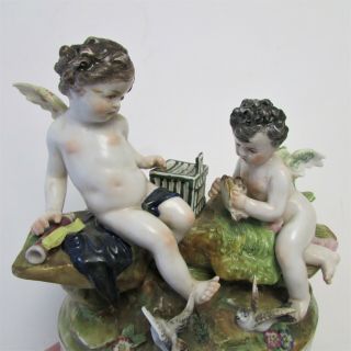Antique Dresden Volkstedt Porcelain Figural Group of a Putto with Birds 6