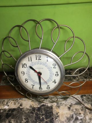 Vintage United Clock Corp.  Electric Wall Clock With Metal Gold Color Grate