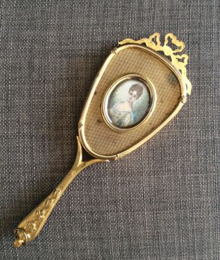 Antique Small Hand Mirror In Gilded Bronze With Miniature Painting.