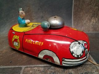 Antique T.  Cohn (tin) Metal Fire Chief Truck Bell Ringing Pull Toy