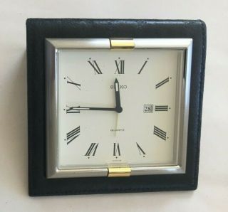 Vintage Seiko Travel Alarm Clock Black Leather Base Brass Frame Date.