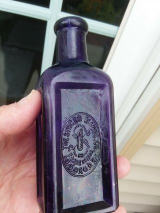 Deep Purple Singer Sewing Machine Oil Bottle Needle & Thread Graphic Early 1900s
