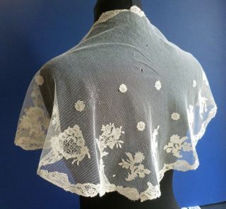 A Machine Net Collar Appliqued With 18th Century Needle Made Alencon Lace