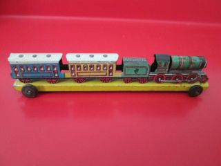 Antique German Tin Penny Toy - Train On Wheeled Platform - 9 Of 17 Listed