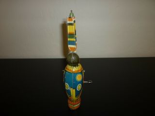 J CHEIN CIRCUS CLOWN VINTAGE 1930 ' s TIN WIND UP WITH SPINNING PADDLES.  EXC 5