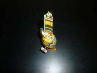 J CHEIN CIRCUS CLOWN VINTAGE 1930 ' s TIN WIND UP WITH SPINNING PADDLES.  EXC 7
