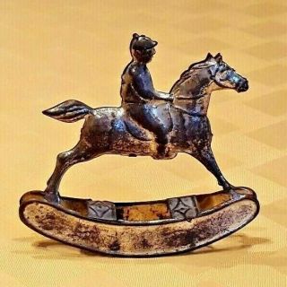 Antique Tin “jockey On Rocking Horse” Penny Toy
