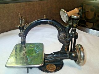 Antique Hand Crank Operated Willcox Gibbs sewing machine.  ca 1904 2