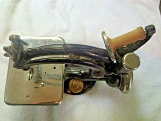 Antique Hand Crank Operated Willcox Gibbs sewing machine.  ca 1904 8