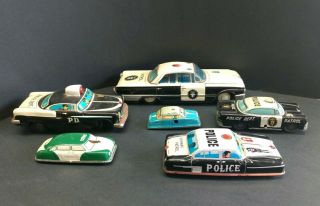 6 Vintage Litho Tin Toy Cars - Police Dept.  / Highway Patrol Cars
