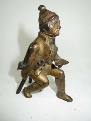 Gilt Cast Iron Figure Of A Colonial Man Cheating At Cards