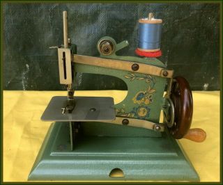 RARE ANTIQUE SCHURHOFF BLUE & GOLD FLOWERS TOY HAND CRANK SEWING MACHINE 2