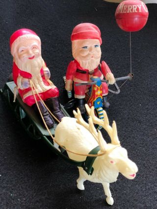 Vintage Celluloid Key Wind - Up Santa Claus On Sled & Tricycle Christmas Toys