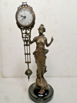 Diana Mystery Swinger Clock - - Clock Movement Swings Back & Forth On The Statue