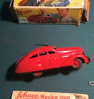 Schuco Wind Up Car U.  S.  Zone Germany.  Magico Auto 2008 Bright Red