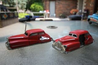 Two 1950’s France Wind - Up Tin Toy Joustra Miracle Cars Model 2002