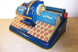 Vintage tin litho toy typewriters,  Marx,  Berwin,  Unique Art N/R 6