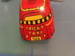 Marx Tricky Taxi Orange 7108 Tin Litho Toy Car,  W Key 6