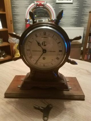 Vintage Mahogany Ships Wheel Mantle Clock.  And Key