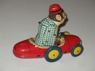 Rare Vintage Tin Wind Up  Pinky  Monkey In Race Car Great Aaa Chein