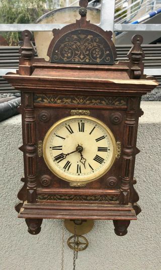 100,  Year old VINTAGE ANTIQUE WALL CLOCK W PENDULUM AND CHIME 4