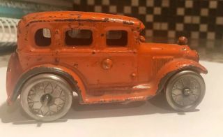 Vintage Ac Williams,  Orange Cast Iron Sedan Car - 4 1/4 "