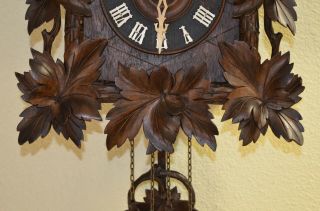 Antique Cuckoo Clock with a Ram on top of the topper very rare 7