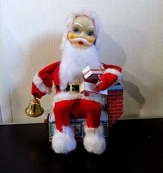 Vintage Battery Operated Santa Claus On House Bellringer Toy,  Made In Japan.  60s