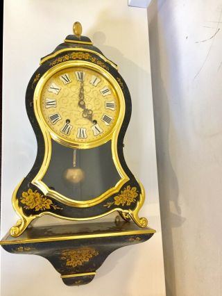 Vintage Swiss Made Eluxa Clock With Wall Bracket.