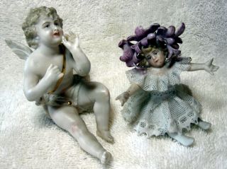 A Antique German Bisque Porcelain Lace Figurine And A Cherub Putti
