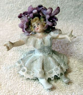 A Antique German Bisque Porcelain Lace Figurine and a Cherub Putti 2