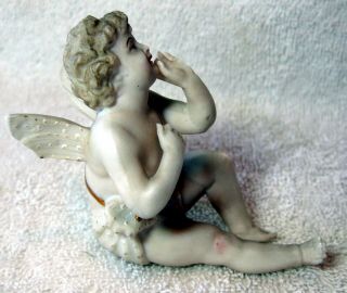 A Antique German Bisque Porcelain Lace Figurine and a Cherub Putti 8