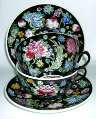 Two Hand Painted Chinese Cups & Saucers (floral On Black Background Pattern)