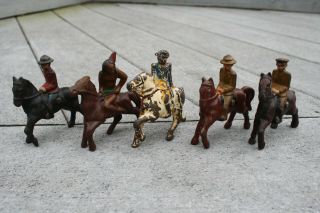 4 Cast Iron Toy Soldiers On Horse 