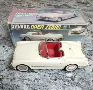 1953 Chevrolet Corvette Convertible Tin Friction Toy White W Red Toy 1/18,