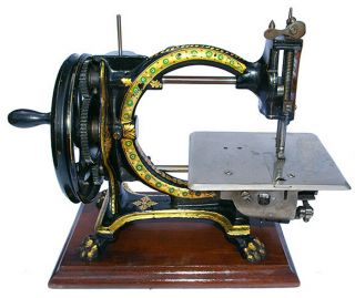 antique cast - iron hand - crank sewing machine 2