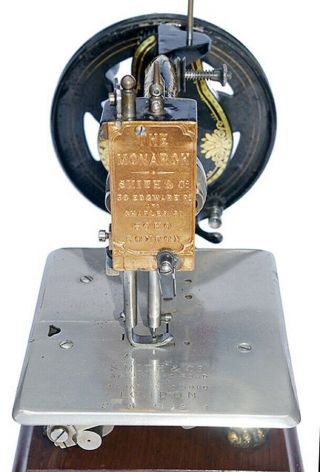 antique cast - iron hand - crank sewing machine 4