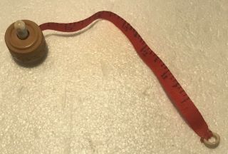 Tape Measure Made From Vegetable Ivory With A Stanhope In The Winder