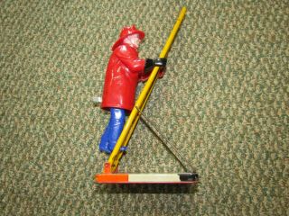 Vintage Marx Wind - Up Climbing Fireman Metal Base Plastic Fireman
