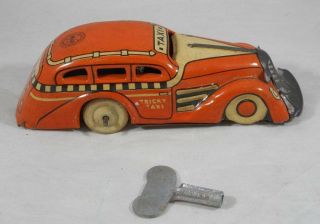 Vintage Marx Tin Litho Tricky Taxi Cab Wind Up Car