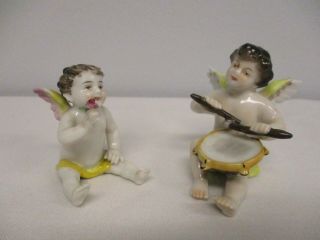 2 Vintage German Volkstedt Porcelain Cherub Figurines Drumming & Smelling Rose
