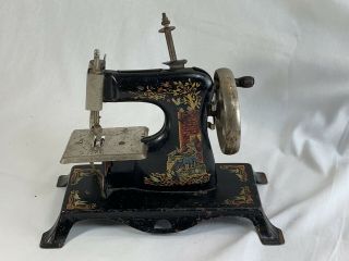 Vintage Hand Crank Painted Toy Sewing Machine German Eagle