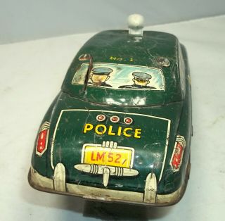 Marx Dick Tracy squad car no.  1,  beat up,  but roof light is intact (11) 4