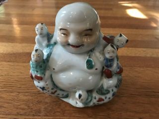 Porcelain Statue Of Laughing Buddha With Children Marked - 5 7/8 By 5 Inches